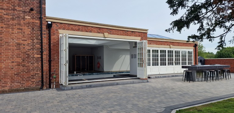 Accoya Bi-Folding Doors in Swimming Pool Extension.